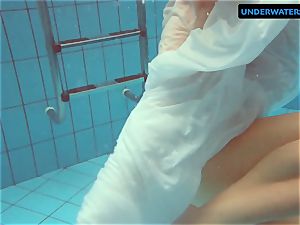 redhead Diana warm and horny in a white dress